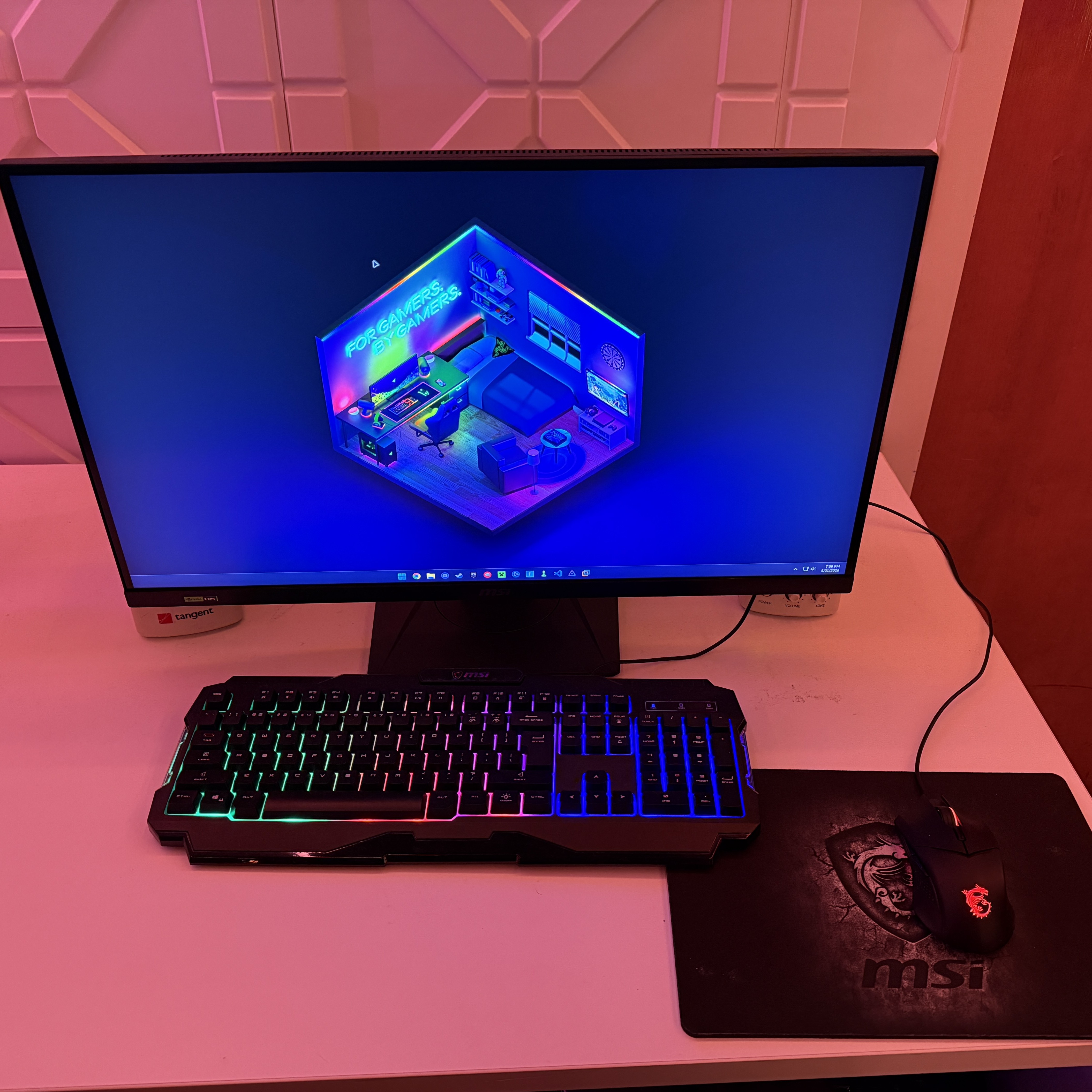 Tournament gaming PC setup with MSI monitor and RGB keyboard